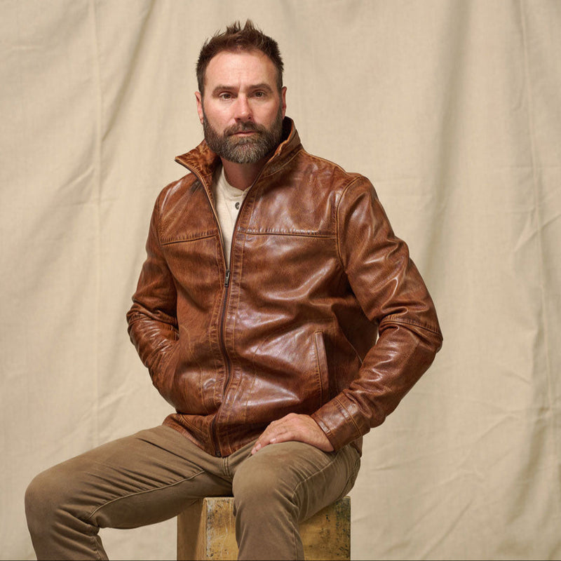 Man wearing the Buffalo Jackson Sedona lightweight leather jacket in copperwood brown