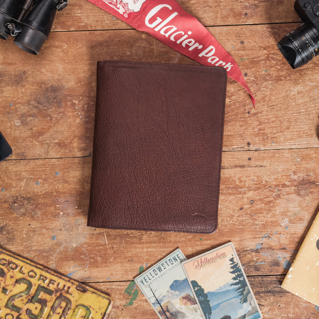 Closed view of the limited edition Roosevelt buffalo grain leather travel padfolio, showcasing its sleek and elegant design.